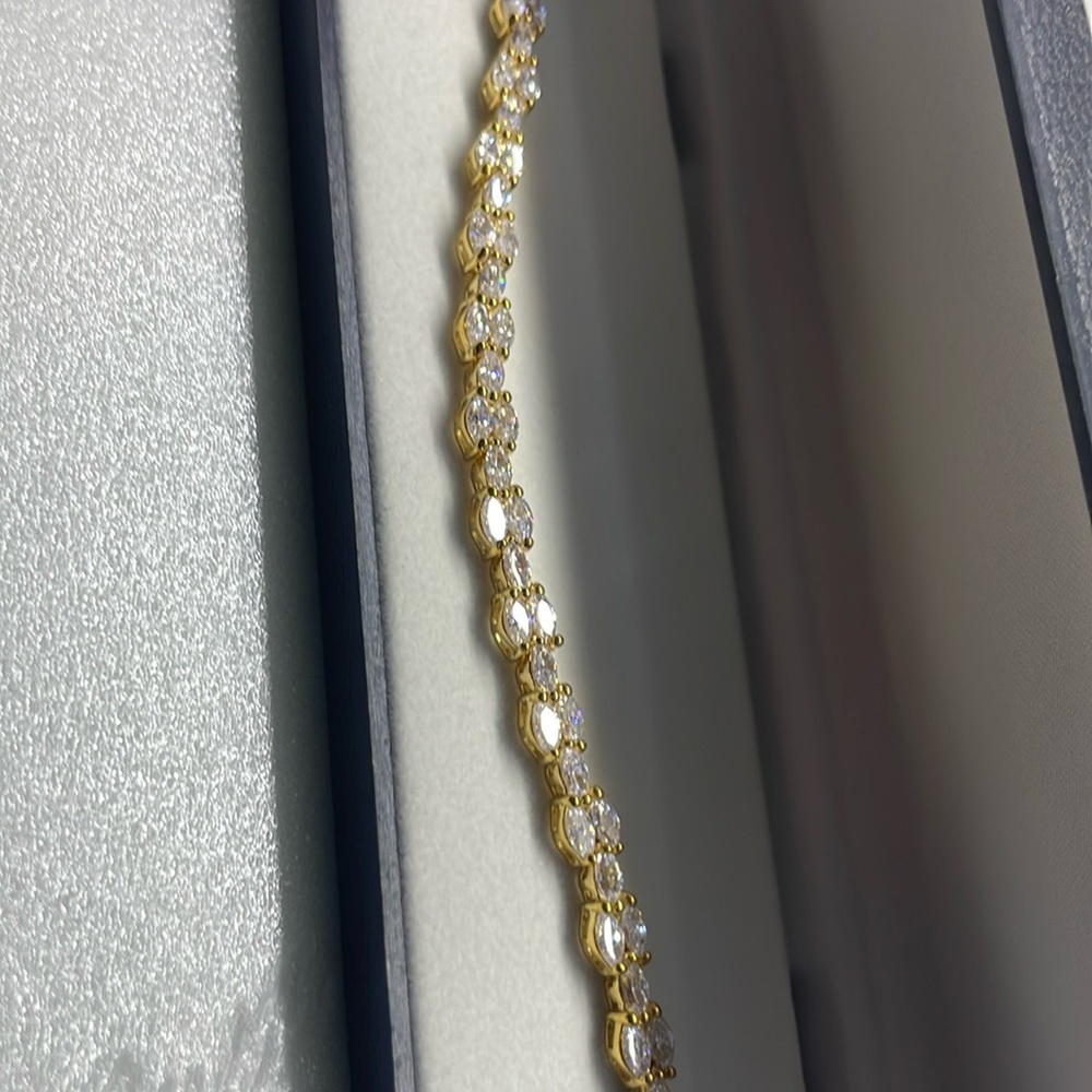 Gorgeous CZ diamond bracelet triple plated gold over rhodium